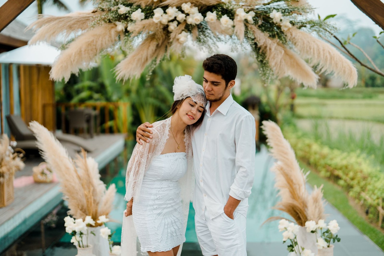 Intimate poolside wedding moment in a Bali villa